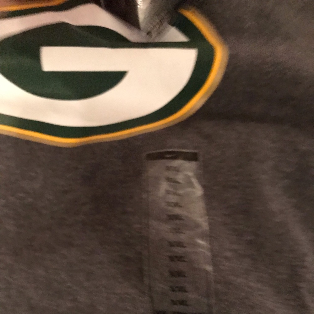 New  with tags NFL Green Bay Packers sweat shirt and pants.